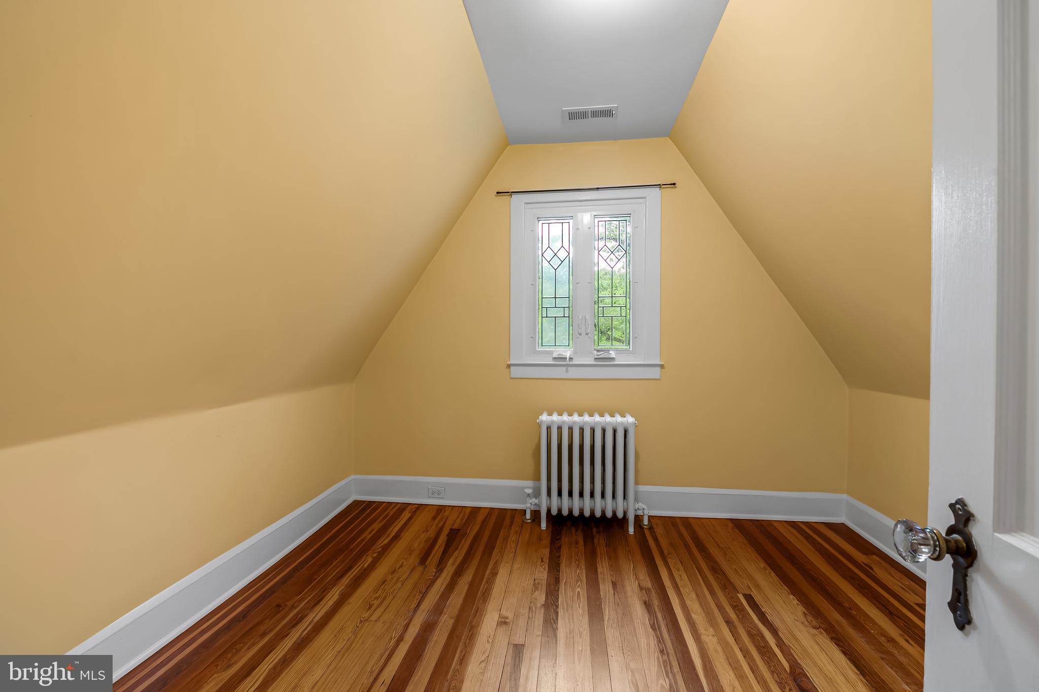 529 Overbrook Road Baltimore, MD 21212 - Photo 35 of 40 a view of a room with wooden floor and window