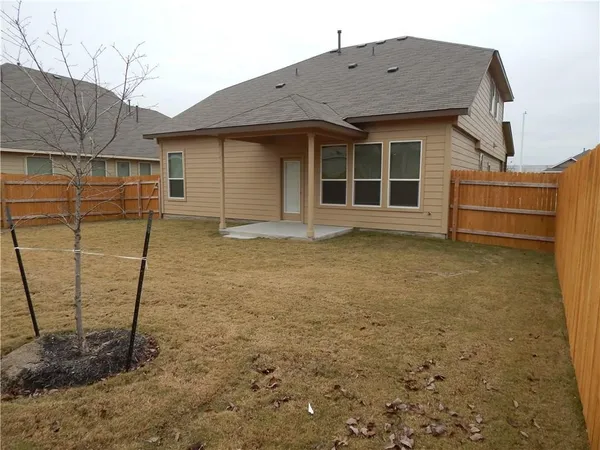 a house view with a outdoor space