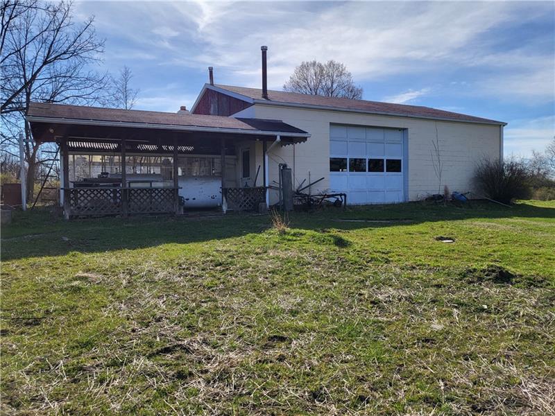 855 Hookstown Grade Road Coraopolis, PA 15108 - Photo 18 of 24 a front view of a house with garden
