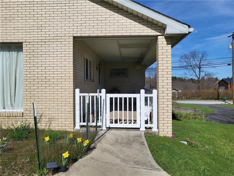 855 Hookstown Grade Road Coraopolis, PA 15108 - Photo 3 of 24 a view of a house with backyard and a garden