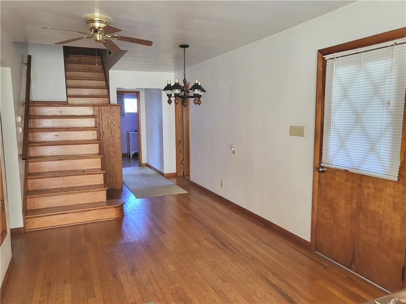 855 Hookstown Grade Road Coraopolis, PA 15108 - Photo 4 of 24 a view of a hallway with wooden floor and staircase