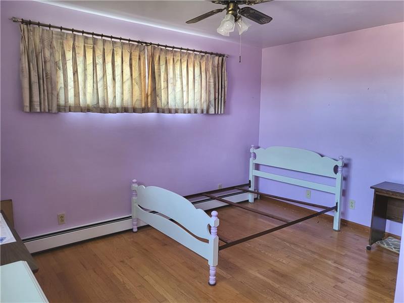 855 Hookstown Grade Road Coraopolis, PA 15108 - Photo 10 of 24 a bench sitting in a room next to a window