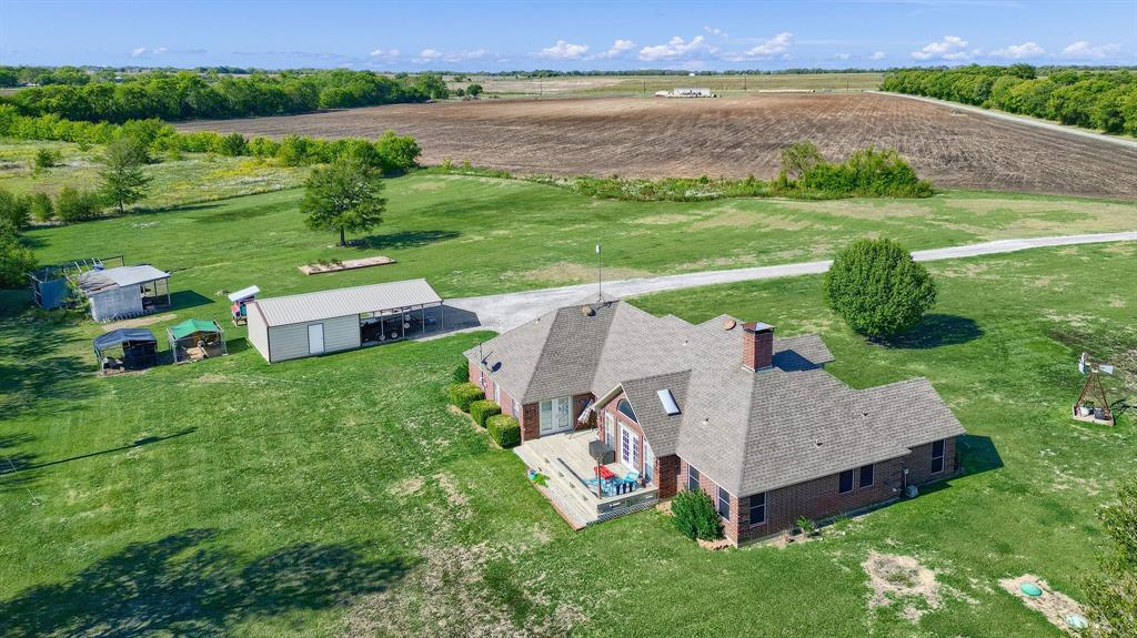 688 Harris Road Howe, TX 75459 - Photo 13 of 14 an aerial view of a house with garden space and street view
