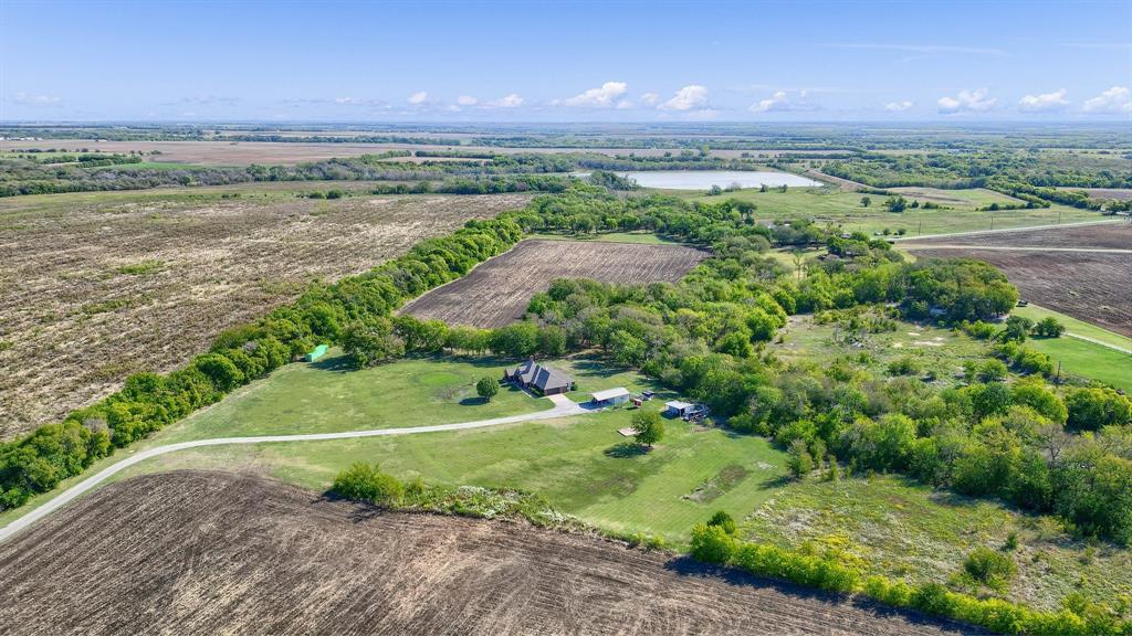 688 Harris Road Howe, TX 75459 - Photo 5 of 14 an aerial view of a golf course with a yard