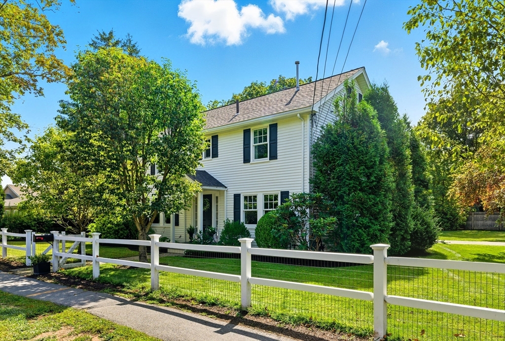 53 Prairie Street Concord, MA 01742 - Photo 1 of 26 a view of a house with a backyard