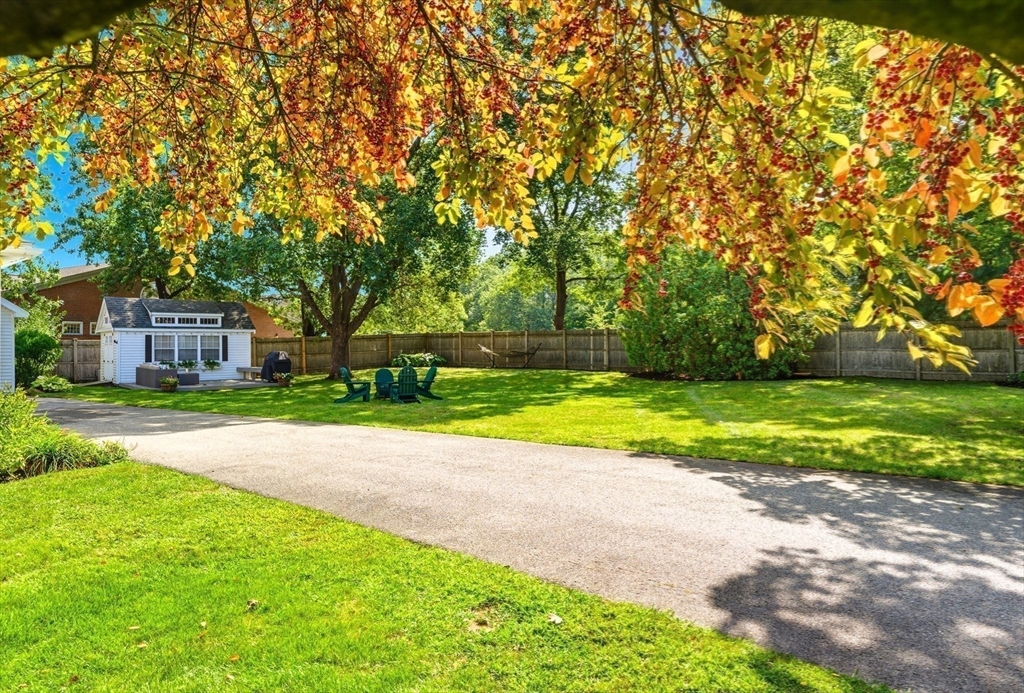 53 Prairie Street Concord, MA 01742 - Photo 23 of 26 a view of a house with a big yard and large trees