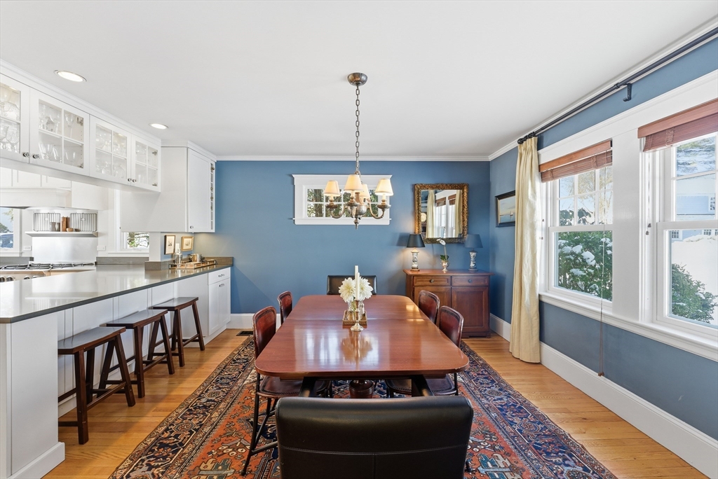 53 Prairie Street Concord, MA 01742 - Photo 5 of 26 a living room with furniture and a chandelier