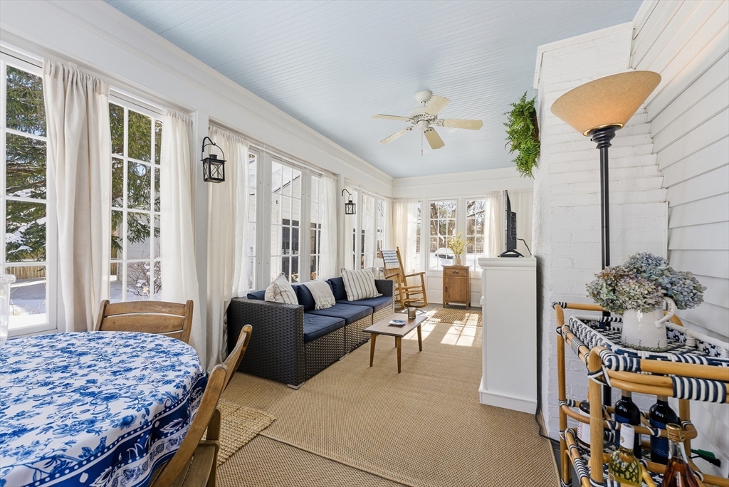 53 Prairie Street Concord, MA 01742 - Photo 10 of 26 a living room with furniture and a large window