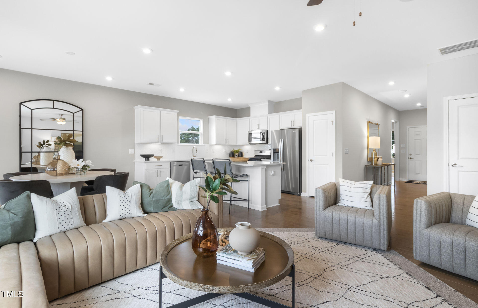 345 Brookside Drive Raleigh, NC 27603 - Photo 5 of 10 a living room with furniture and kitchen view