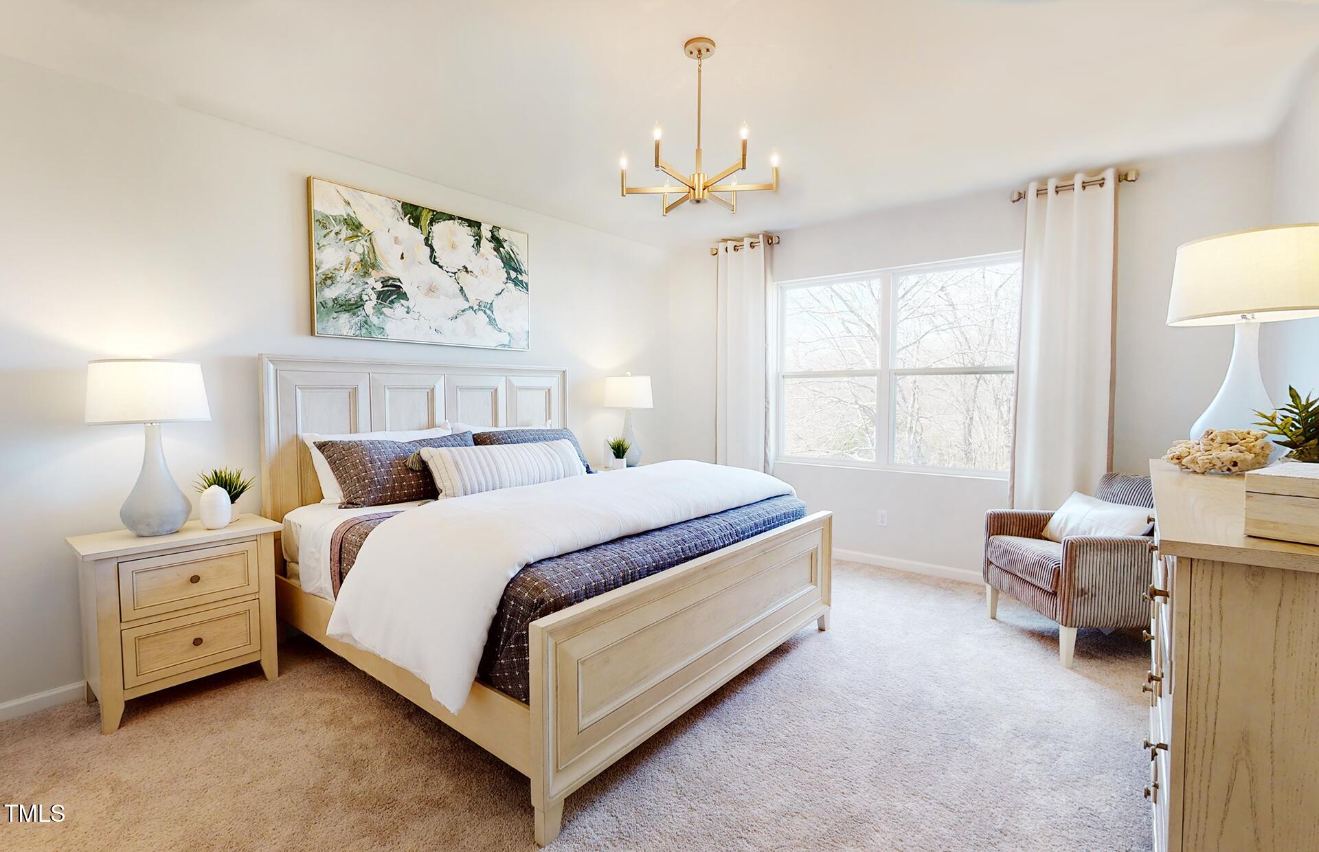 345 Brookside Drive Raleigh, NC 27603 - Photo 7 of 10 a bed room with a bed and a window