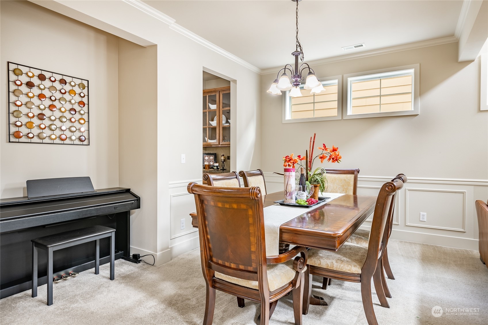 22831 36th Drive Southeast Bothell, WA 98021 - Photo 11 of 40 a dining room with furniture a chandelier and wooden floor
