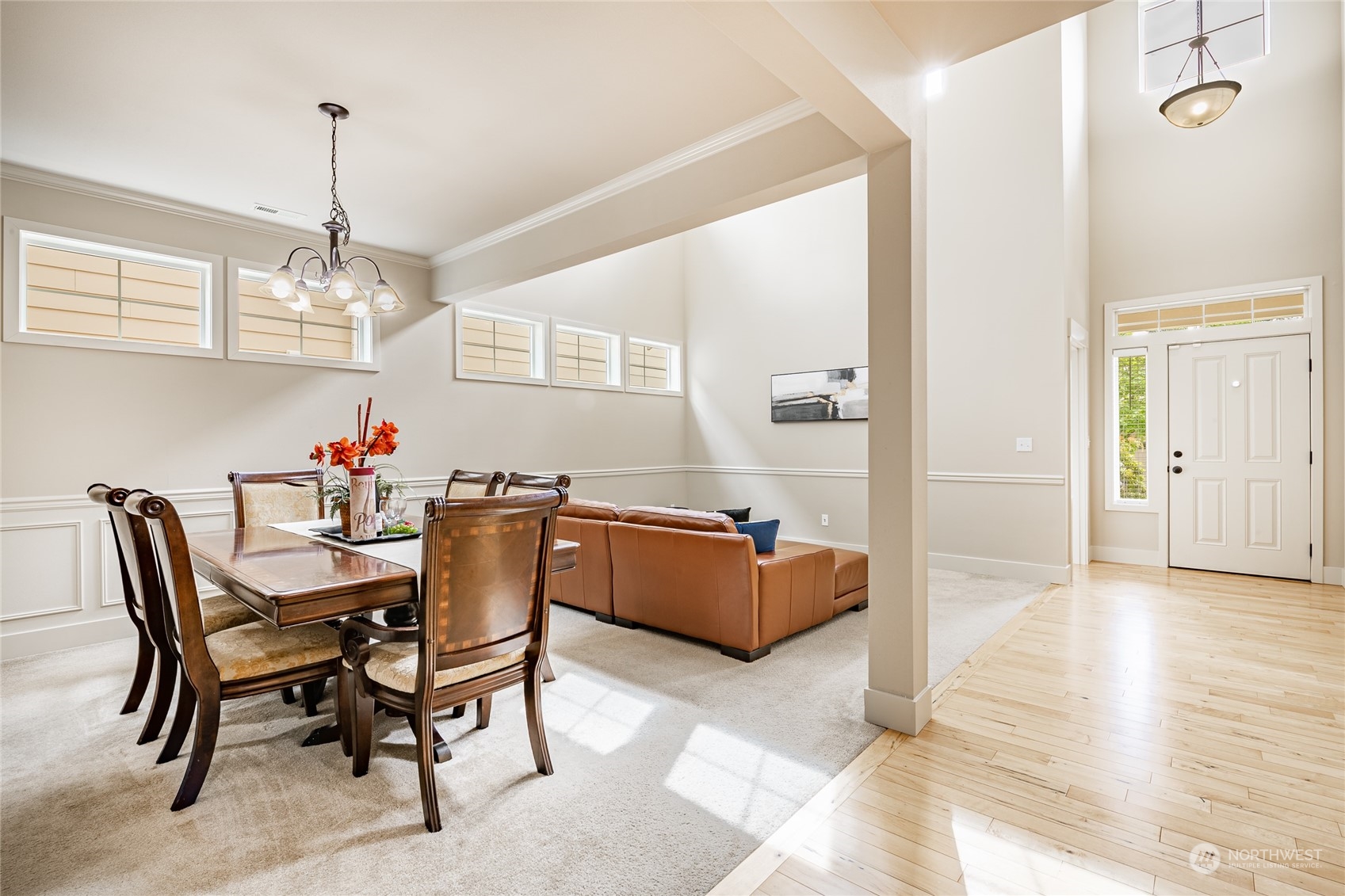 22831 36th Drive Southeast Bothell, WA 98021 - Photo 12 of 40 a dining room with furniture a chandelier and wooden floor