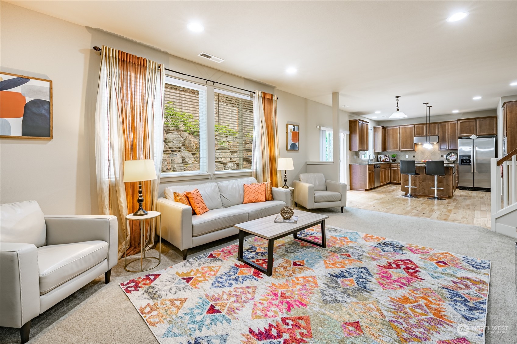 22831 36th Drive Southeast Bothell, WA 98021 - Photo 2 of 40 a living room with furniture and a large window