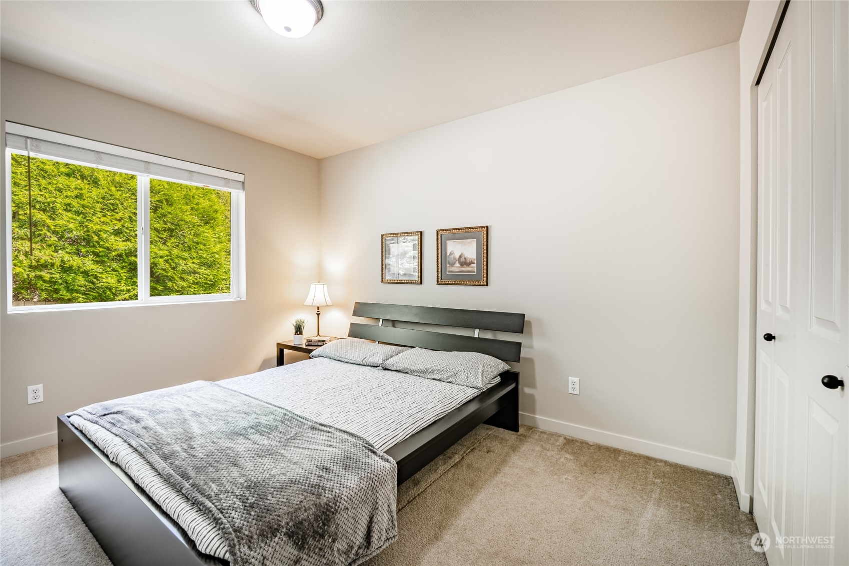 22831 36th Drive Southeast Bothell, WA 98021 - Photo 29 of 40 a bedroom with a bed and a window
