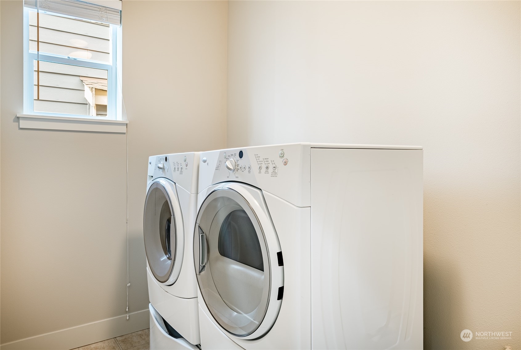 22831 36th Drive Southeast Bothell, WA 98021 - Photo 33 of 40 a utility room with dryer and washer