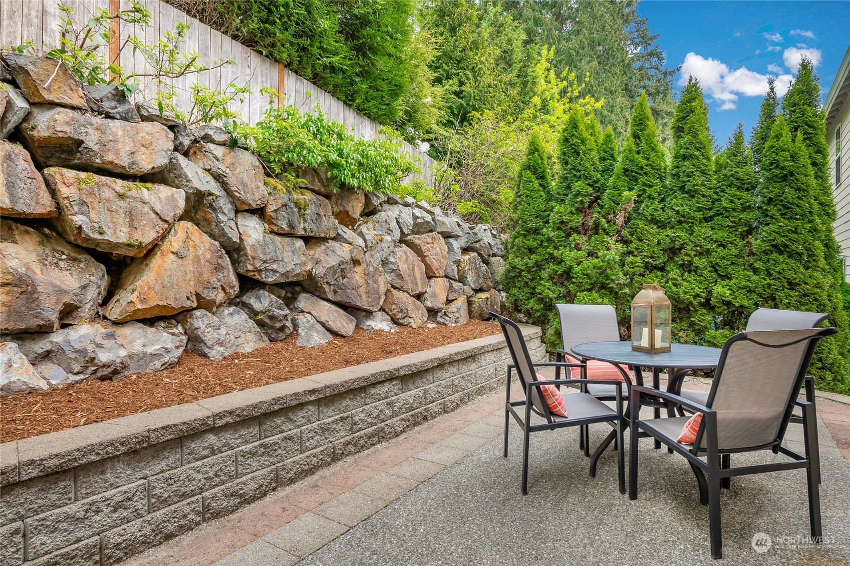 22831 36th Drive Southeast Bothell, WA 98021 - Photo 34 of 40 a view of a chairs and table in the backyard