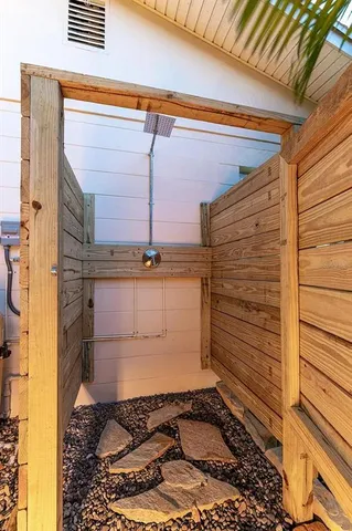 a swimming pool with outdoor seating and yard