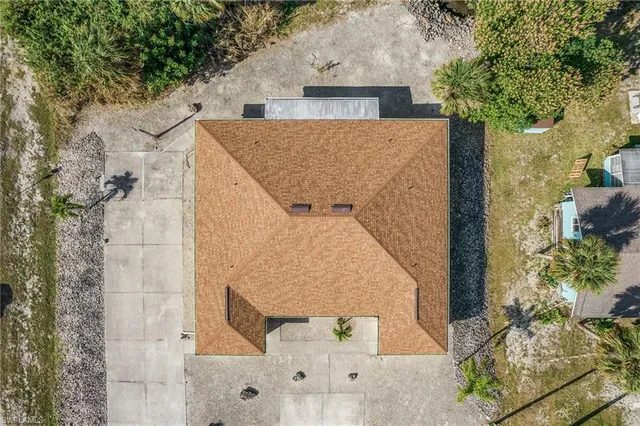 an aerial view of a house having yard