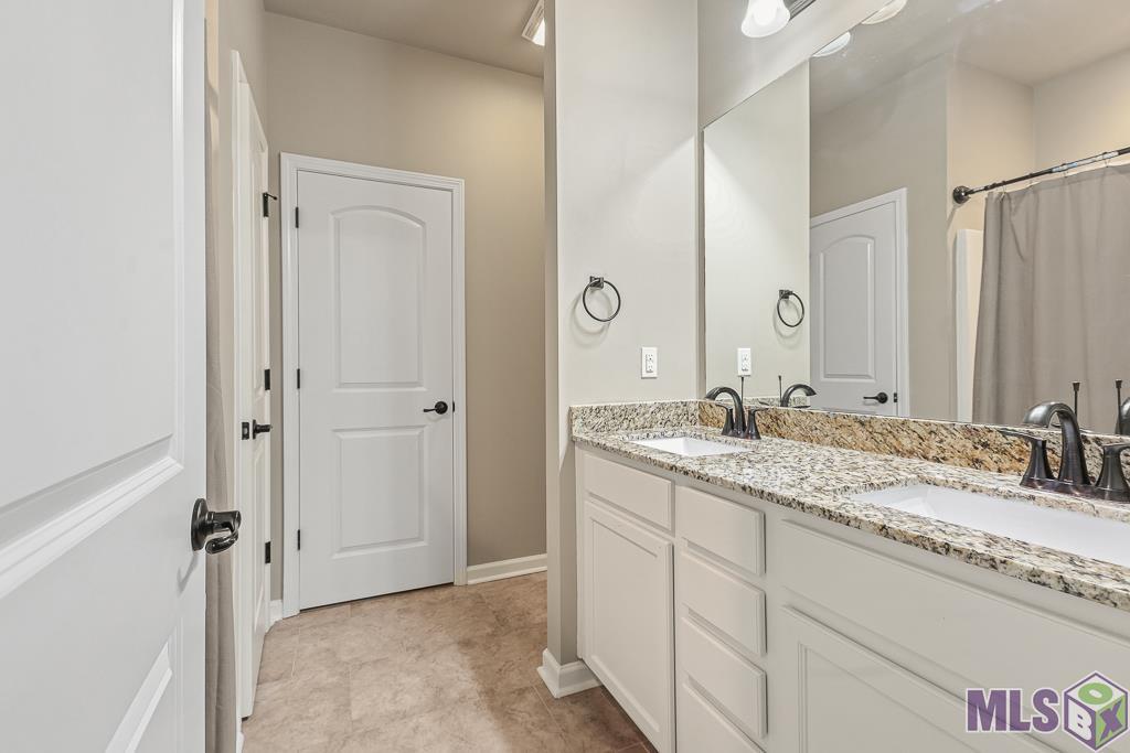 2750 South Roth Avenue Gonzales, LA 70737 - Photo 17 of 18 Double vanity in main bedroom