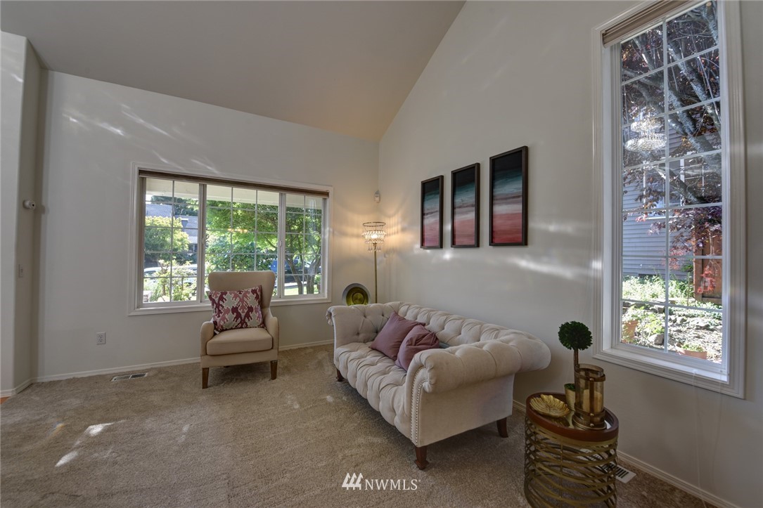 23215 9th Place West Bothell, WA 98021 - Photo 5 of 24 a living room with furniture and a large window