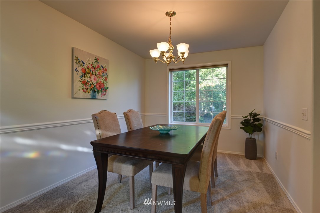 23215 9th Place West Bothell, WA 98021 - Photo 7 of 24 a dining room with furniture and window