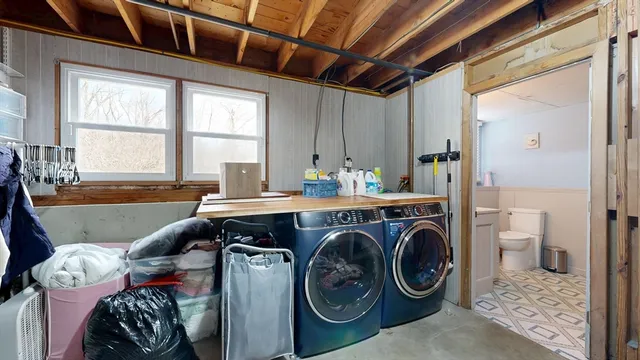 a storage room with washer and dryer