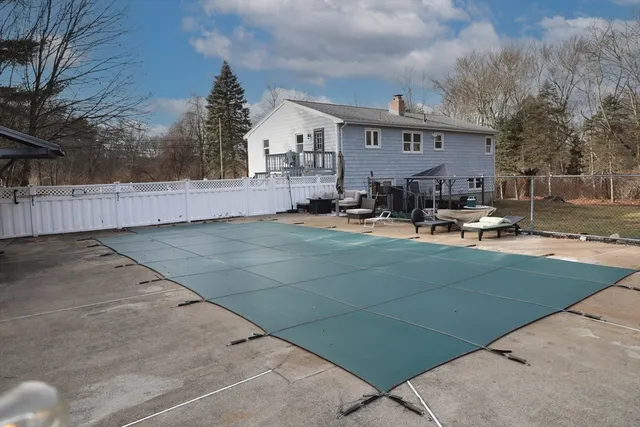 a view of a patio with a yard
