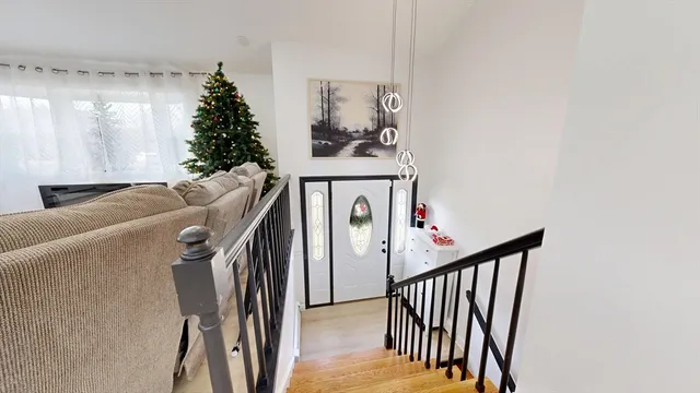 a view of a hallway with stairs