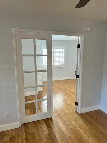 a bathroom with a shower sink and mirror
