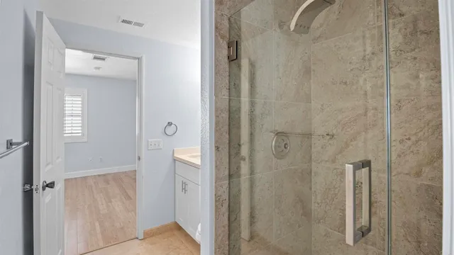 a bathroom with a sink toilet and vanity