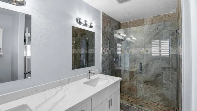 a living room with a couch and a rug