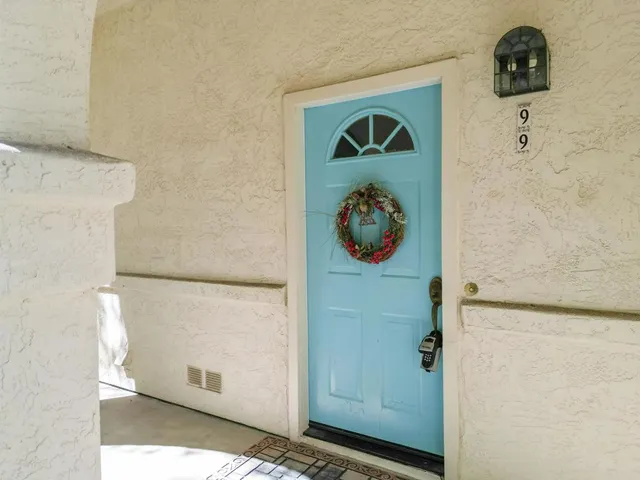 a bathroom with a sink a mirror and a window