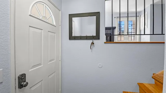 a kitchen with stainless steel appliances a refrigerator and a stove top oven