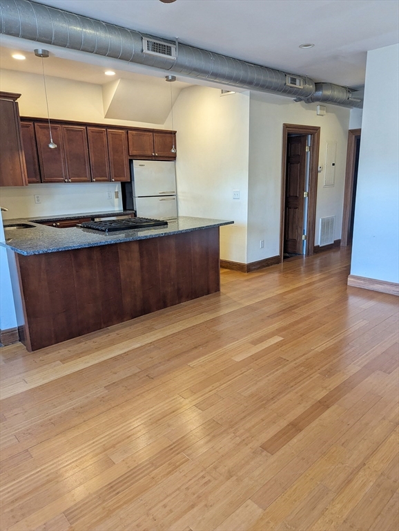 176 Hillside Street, Unit 101 Boston, MA 02120 - Photo 6 of 16 a view of kitchen with a sink