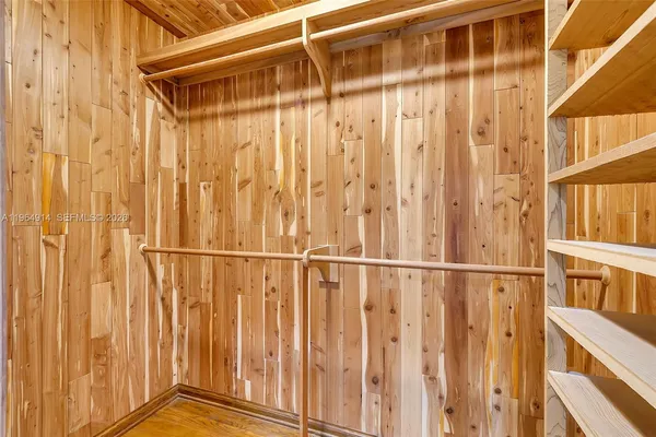 a view of a wooden door with a glass door