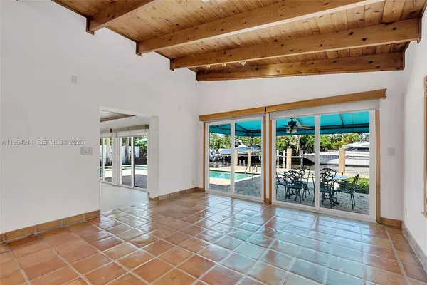 a view of livingroom with furniture and floor to ceiling window