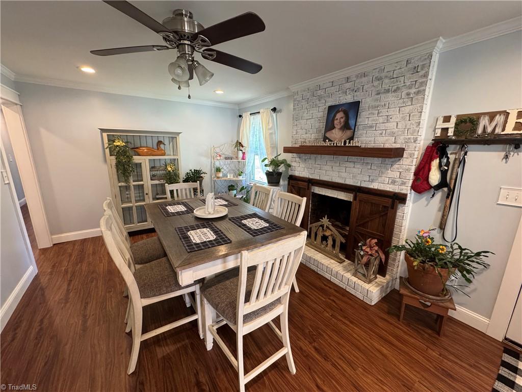 2436 Wickham Road Kernersville, NC 27284 - Photo 8 of 31 Dining room with fireplace