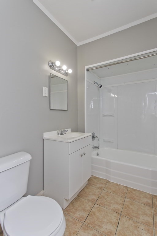 69 Appleton Street Springfield, MA 01108 - Photo 23 of 34 a bathroom with a sink a toilet and shower