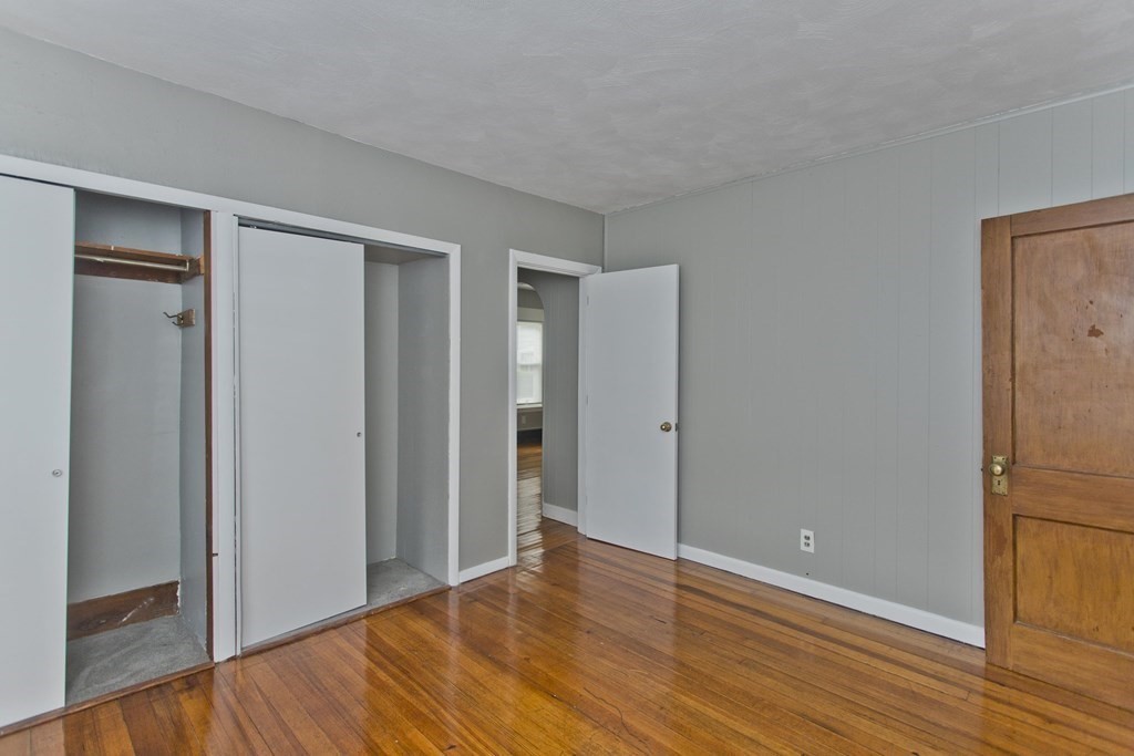 69 Appleton Street Springfield, MA 01108 - Photo 25 of 34 a view of empty room with wooden floor