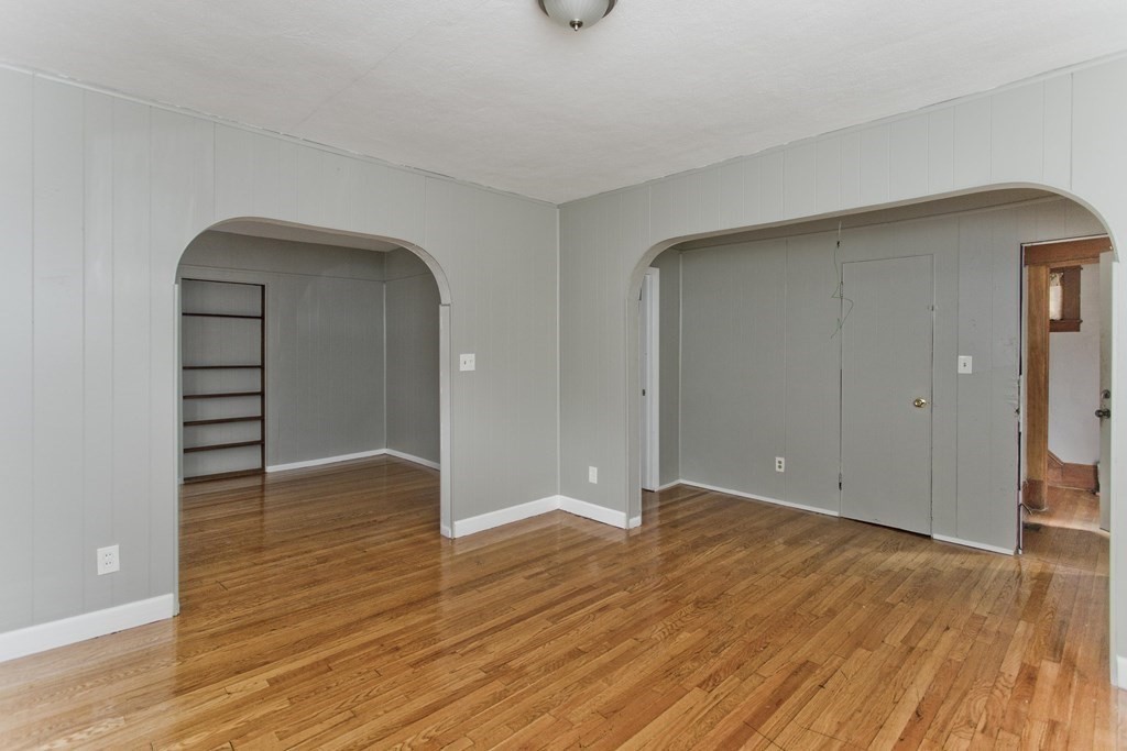 69 Appleton Street Springfield, MA 01108 - Photo 10 of 34 a view of empty room with wooden floor and fan
