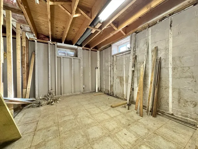 a view of a door with wooden walls