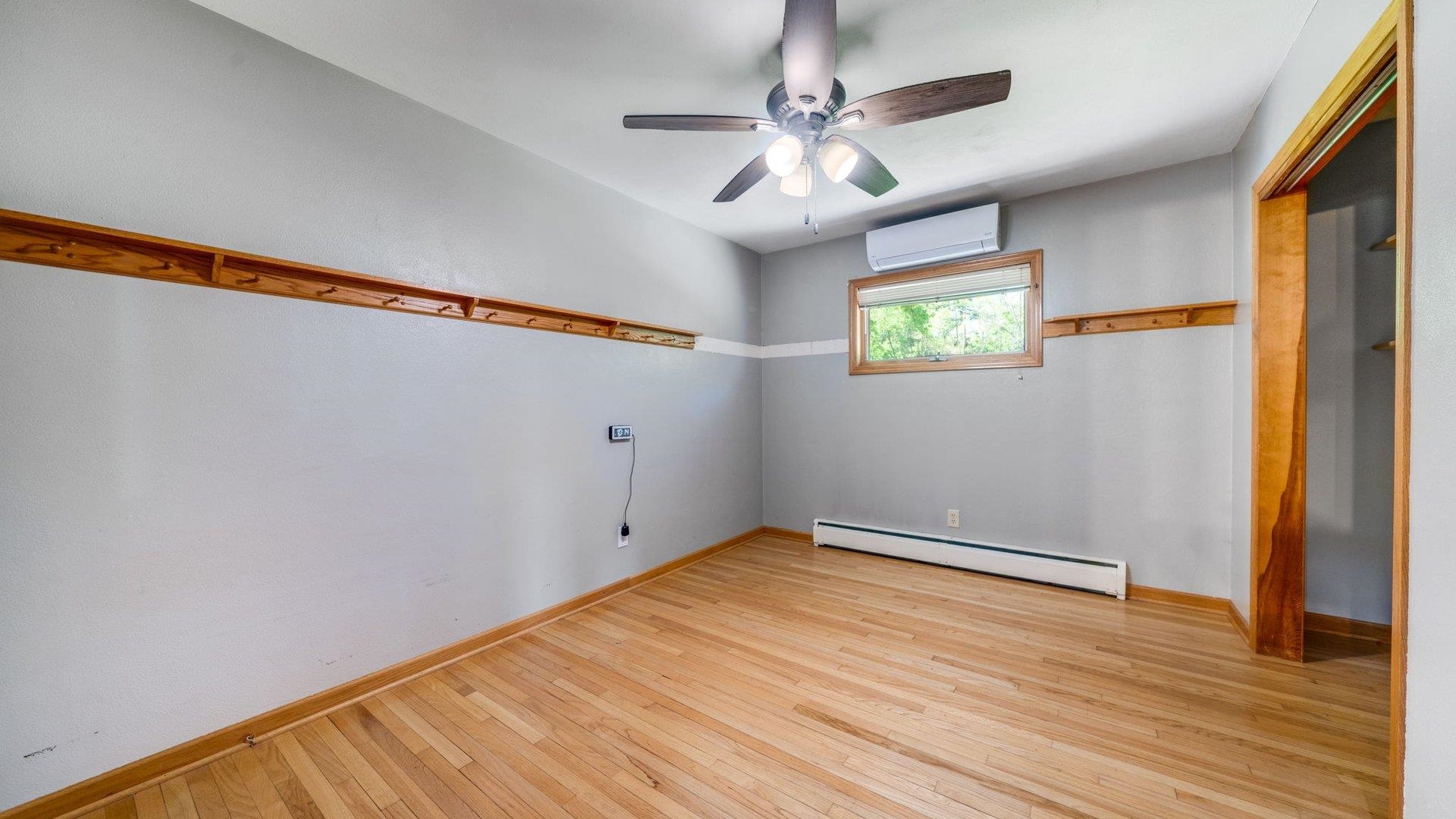 313 West Margaret Fuller Road Oregon, IL 61061 - Photo 20 of 46 a view of empty room with wooden floor