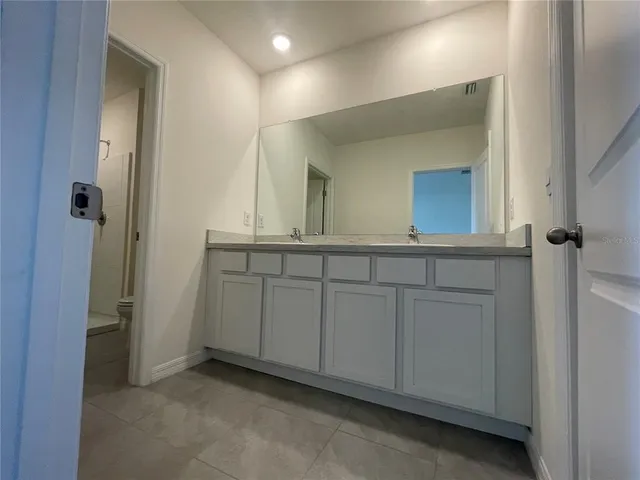 a view of a hallway with closet