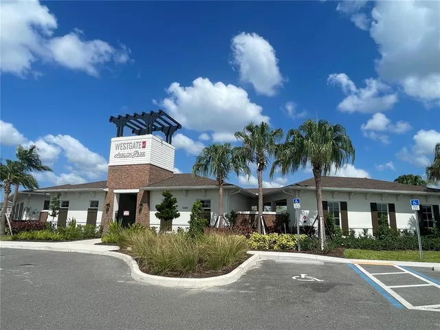 a view of swimming pool with a patio