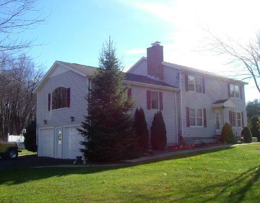 front view of house with a yard