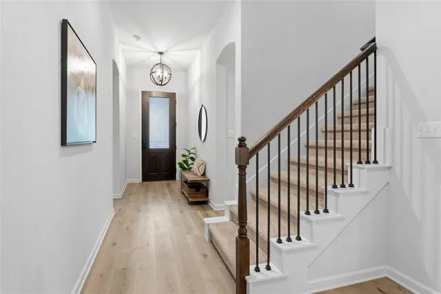 a view of entryway with wooden floor