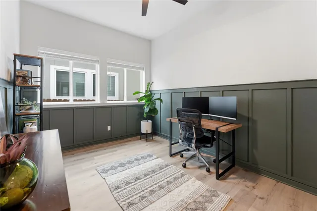 a workspace with furniture and a window