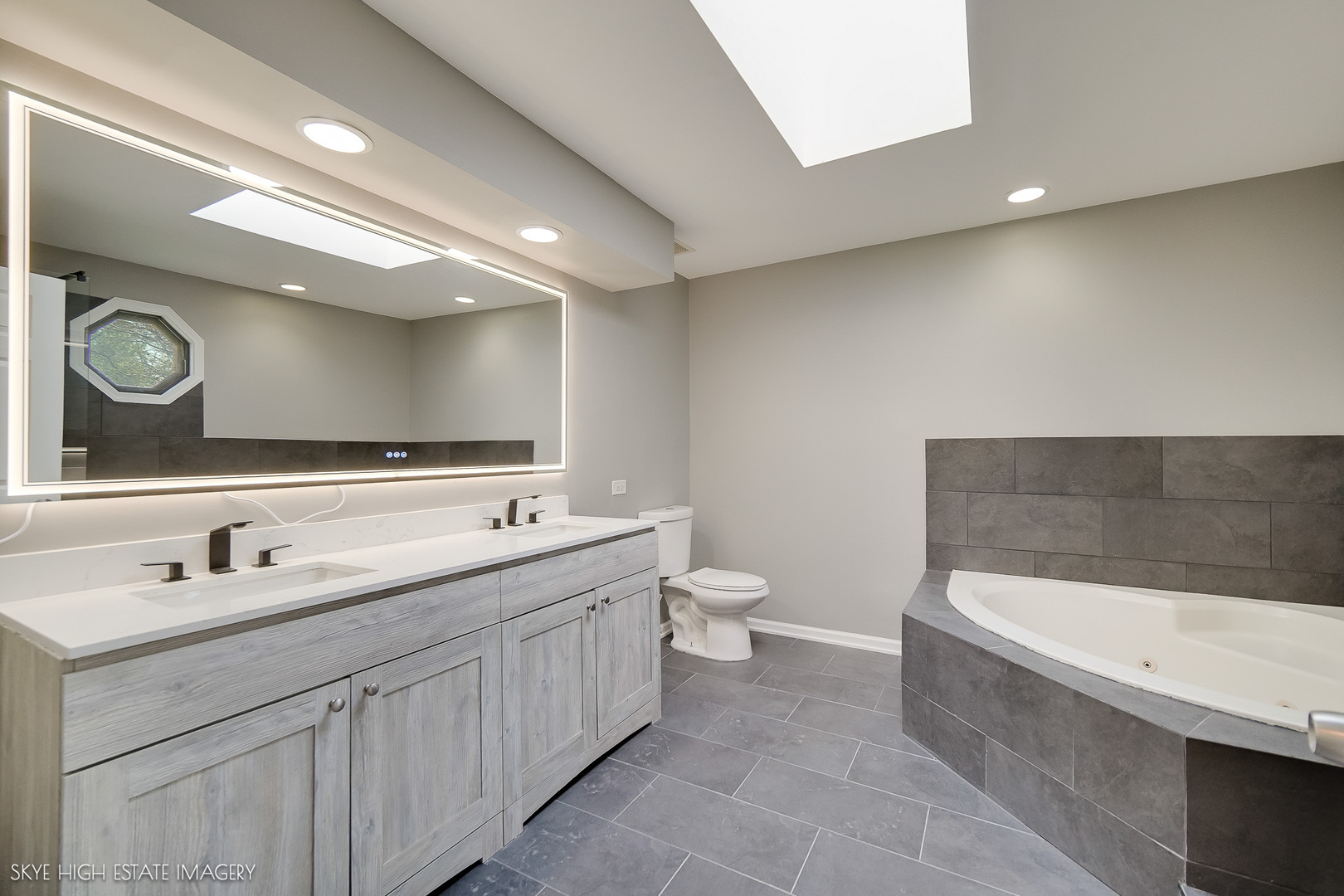 24615 Mulberry Lane Crete, IL 60417 - Photo 12 of 21 a bathroom with a double vanity sink mirror and toilet
