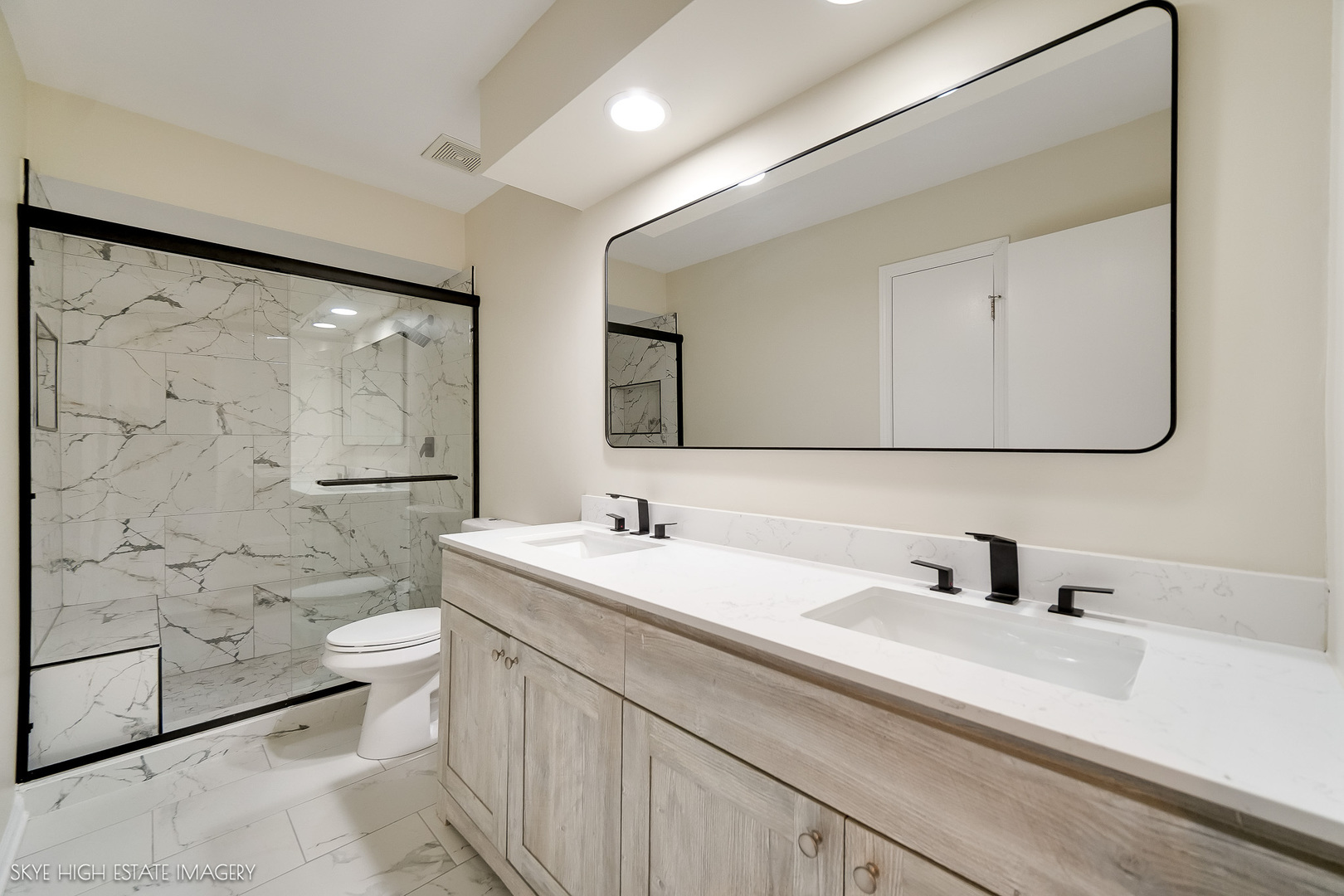 24615 Mulberry Lane Crete, IL 60417 - Photo 14 of 21 a bathroom with a double vanity sink toilet mirror and shower