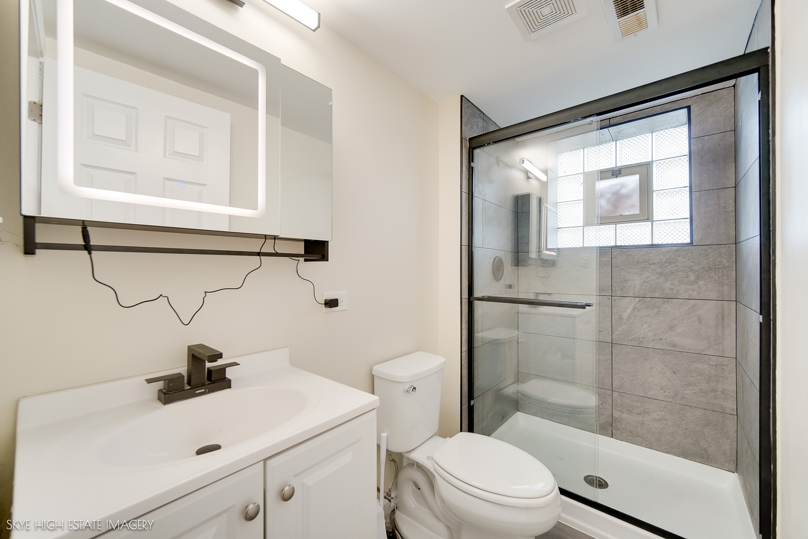 24615 Mulberry Lane Crete, IL 60417 - Photo 16 of 21 a bathroom with a sink mirror vanity and toilet